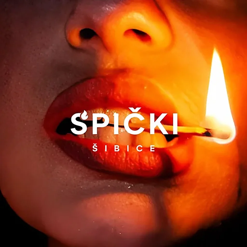 Логотип Spički šibice на фото: губы держат горящую спичку